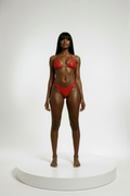 Woman wearing a red bikini on a white background